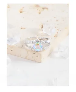 Detailed view of S925 sterling silver ring with wrinkled texture and rainbow zircon stone