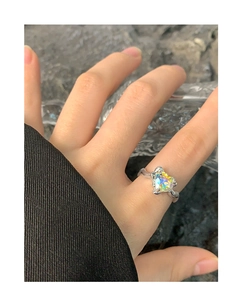 Detailed view of S925 sterling silver ring featuring a colorful heart zircon on finger