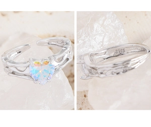 Macro shot of S925 sterling silver hallmark and wrinkled texture on heart ring