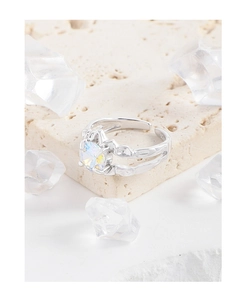 Detailed macro view of S925 sterling silver ring with colorful zircon and lava texture