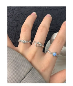 Detail of S925 silver irregular liquid metal rings with blue opal and moonstone
