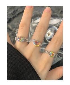 Detailed view of S925 silver rings with pleated texture and colorful heart zircon stones