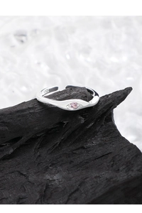 Close-up of S925 sterling silver ring featuring a pink marquise zircon Evil Eye detail