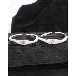 S925 sterling silver devil eye open rings with pink and purple zircon stones on charcoal