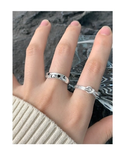 Detailed shot of S925 silver rings with star moon hollow patterns and knot design