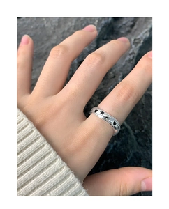 Detail view of S925 silver ring featuring engraved black star moon and heart patterns