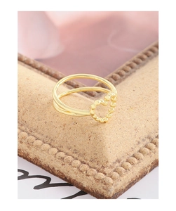Detail of S925 silver double-line ring with hollow heart shape and beaded texture design