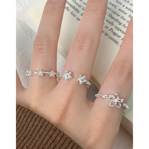 Elegant S925 sterling silver hollow flower rings set for women on model hand