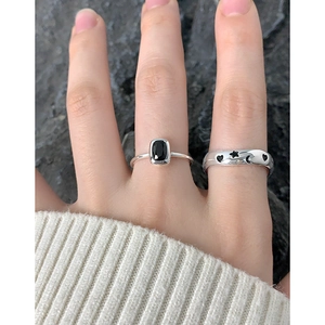 S925 silver ring set featuring black gemstone and star moon heart cutout designs