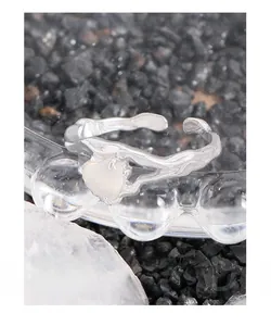 Macro detail of S925 silver heart agate ring with liquid metal lava texture finish