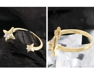 Macro detail of S925 hallmark on gold plated star ring with sparkling cubic zirconia