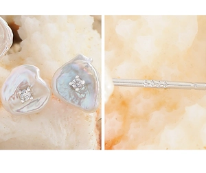 Macro view of S925 sterling silver hallmark and irregular baroque pearl earrings