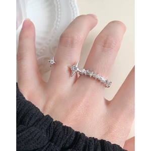 Elegant S925 sterling silver open ring featuring star motifs with zircon stones