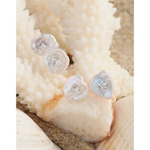 Elegant set of S925 silver baroque pearl earrings with zircon inlay on sea shell background