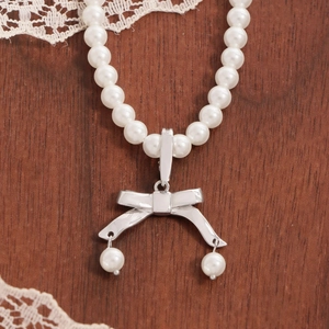 Elegante collana di perle in argento sterling S925 con fiocco su legno