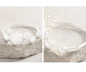 Macro shot of S925 sterling silver stamp on minimalist adjustable bubble ball ring