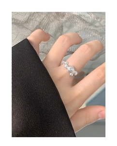 Close-up of S925 sterling silver ring with minimalist bubble-like sphere design on finger