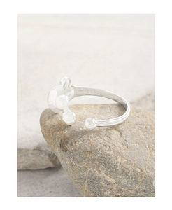 Close-up of S925 sterling silver hallmark on minimalist polished ball ring design