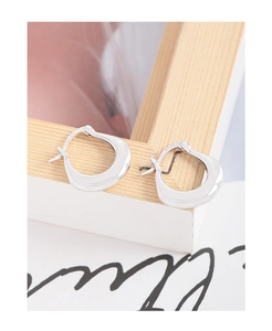 Close-up of S925 sterling silver hallmark on irregular U-shaped hoop earrings