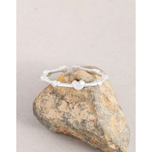 Minimalist S925 sterling silver adjustable open ring with embossed heart pattern design