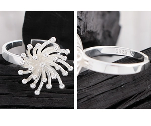 Macro detail of S925 sterling silver ring showing firework design and hallmark stamp