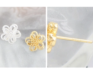 Macro shot of S925 sterling silver stamp on hollow double-layer flower stud earrings