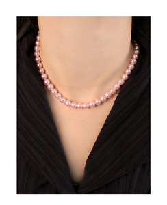 Close-up of pink freshwater pearl necklace showing soft luster on S925 silver chain