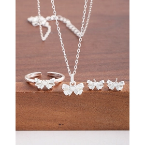 S925 sterling silver jewelry set featuring bow and heart necklace, ring, and earrings