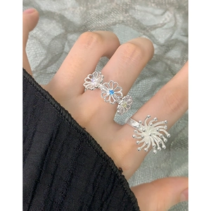 Sparkling silver S925 firework ring with colorful zircon stones on woman hand