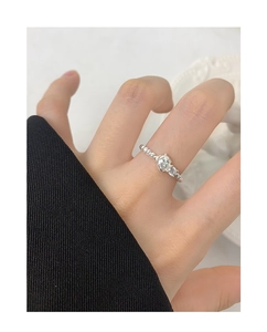 Detailed view of S925 silver beaded ring featuring three sparkling zircon stones