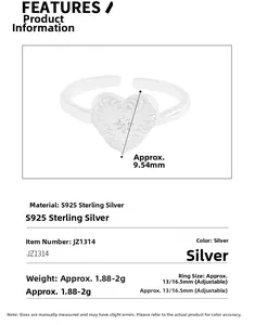 Detail of S925 sterling silver heart ring with embossed texture and zircon inlay