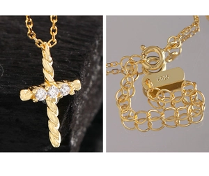 Macro detail of S925 sterling silver twist cross pendant with cubic zirconia stones