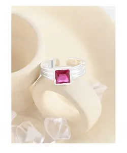 Macro detail of S925 sterling silver stamp and wavy texture on pink zircon ring