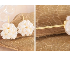 Macro shot of S925 sterling silver stamp on golden pearl cluster ball earrings