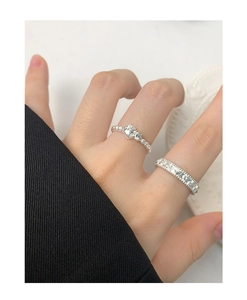 Close-up of S925 silver strawberry-style ring set with sparkling zircon stones