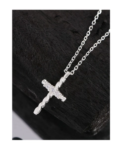 Macro view of S925 sterling silver twisted cross pendant necklace with zircon stones