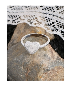 Detail of S925 sterling silver stamp on vintage heart embossed adjustable ring