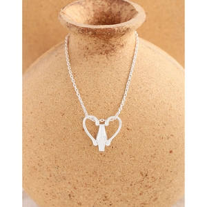 S925 sterling silver necklace with abstract heart pendant displayed on ceramic jar
