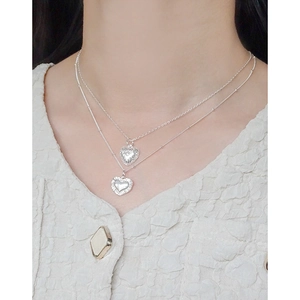 S925 sterling silver double-layer necklace with embossed heart pendant on model