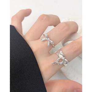 Elegant S925 sterling silver bow knot open rings for women on hand with a modern design