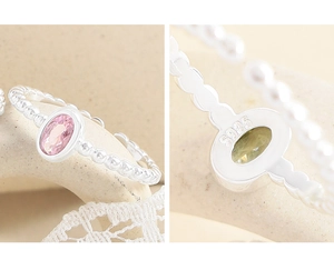 Detail view of the S925 sterling silver hallmark on the beaded pink zircon ring