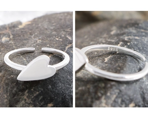 Detailed close-up of S925 hallmark on heart-shaped silver open ring for women