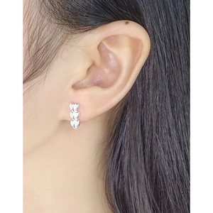 Minimalist S925 sterling silver triple heart stud earrings for women on earlobe