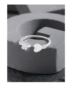 Macro shot of S925 sterling silver ring showing key and heart design and hallmark