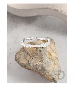 Detailed close-up of S925 sterling silver floral ring with adjustable open band design
