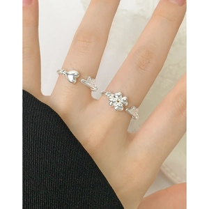 S925 sterling silver adjustable open rings with heart and clover crown designs on hand