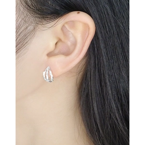 Minimalist S925 sterling silver irregular fold texture studs on model
