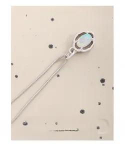 Close-up of S925 silver necklace featuring a hollow garland pendant with oval opal stone