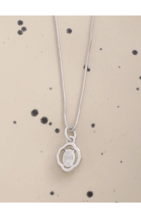 Close-up of S925 sterling silver hallmark on the hollow floral wreath pendant and snake chain