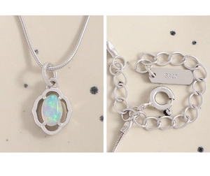 Detailed view of S925 sterling silver opal pendant and clasp with metal hallmark